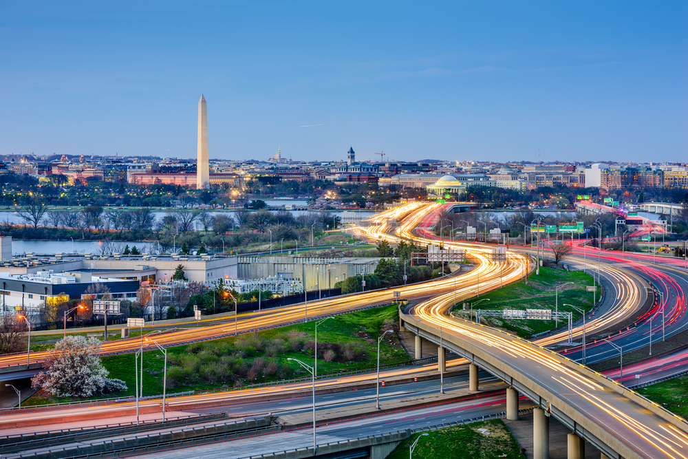 Washington, DC skyline of monuments and highways.-1